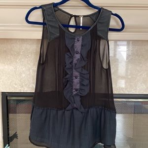 Free People black and navy ruffled faux leather sheer tank top.